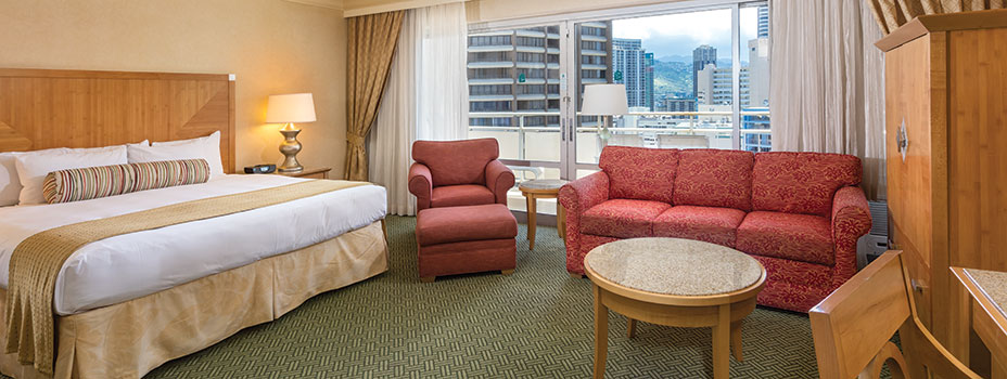 Bedroom of a Studio Suite at the Waikiki Marina resort at the Ilikai